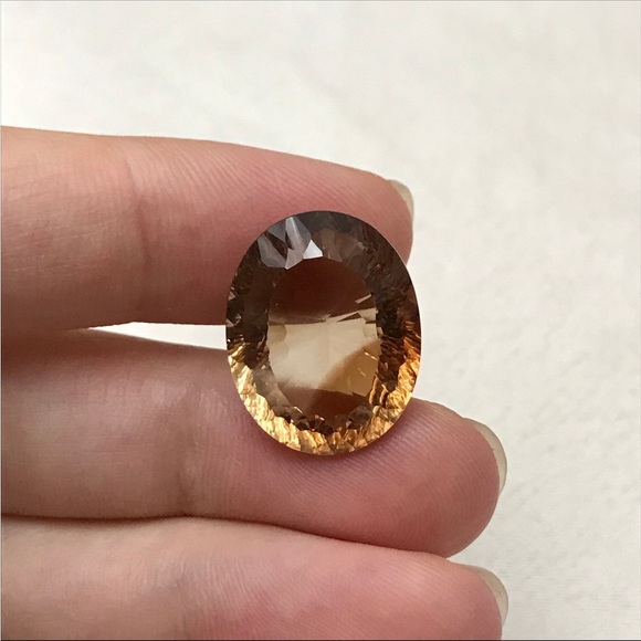 20.90 carat Natural Brown Topaz 19x15mm Oval Cut
Faceted Gemstone, Large stone - Picture 3 of 9
